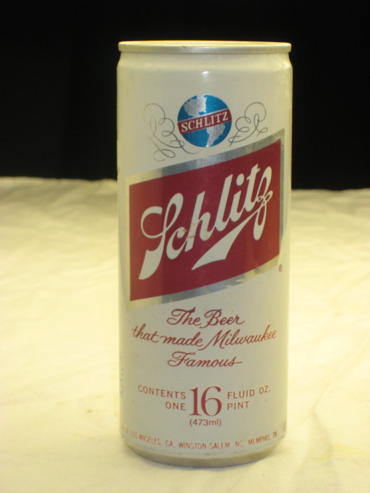 A 16-ounce can of Schlitz beer with the slogan The Beer that made Milwaukee Famous printed on the front.