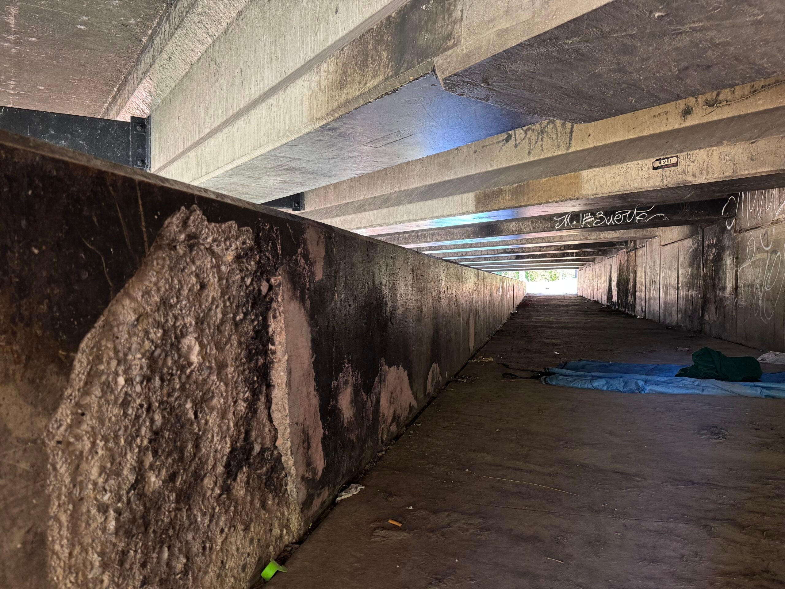 Search underway for people missing from riverside homeless encampment since flood