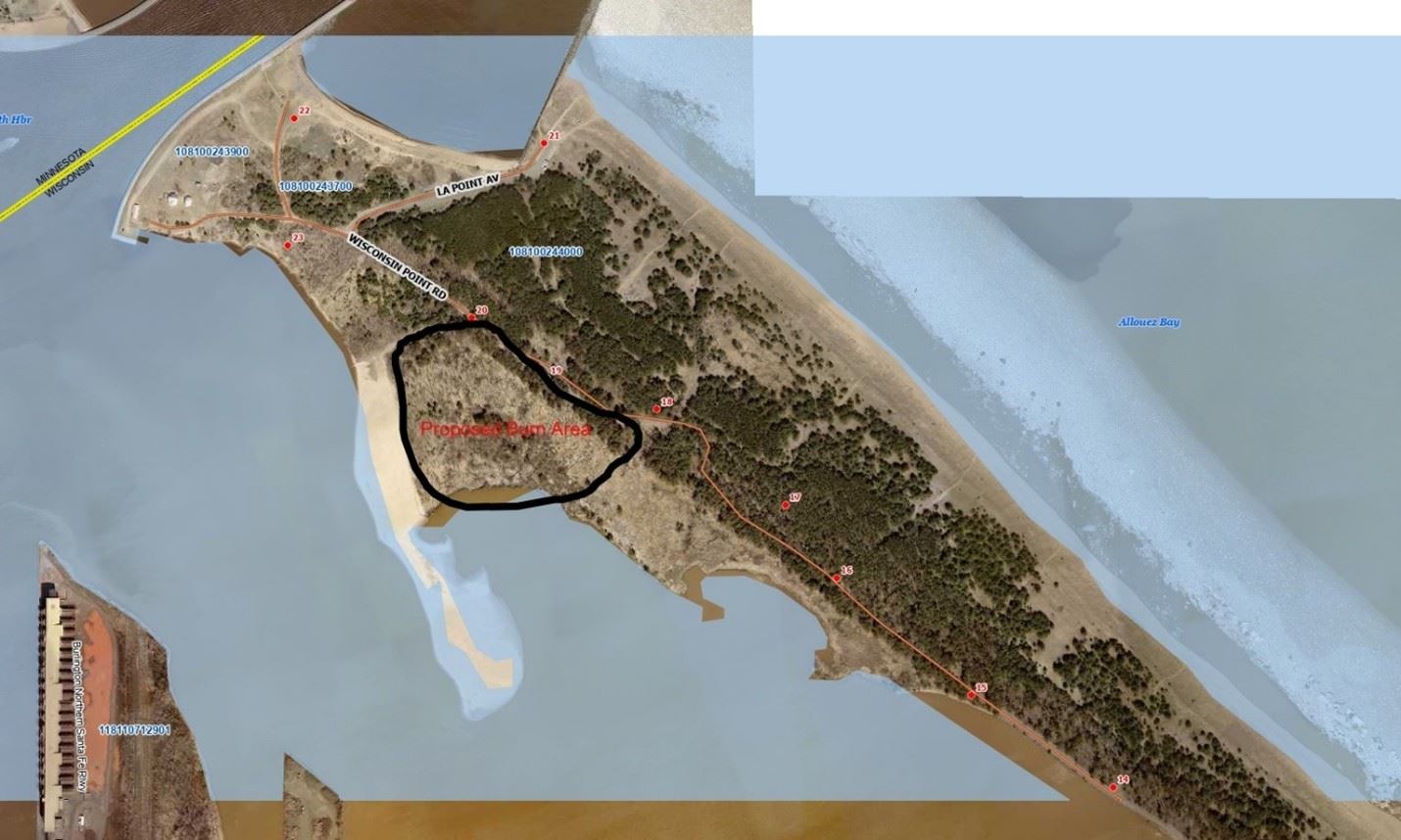 Aerial map of a coastal area with a section labeled Proposed Lease Area outlined in black amid trees, bordered by water and a marked walking trail.