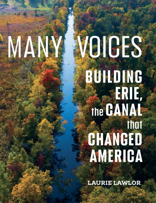 Aerial view of the Erie Canal surrounded by colorful autumn trees, with the book title Many Voices: Building Erie, the Canal that Changed America by Laurie Lawlor overlaid.