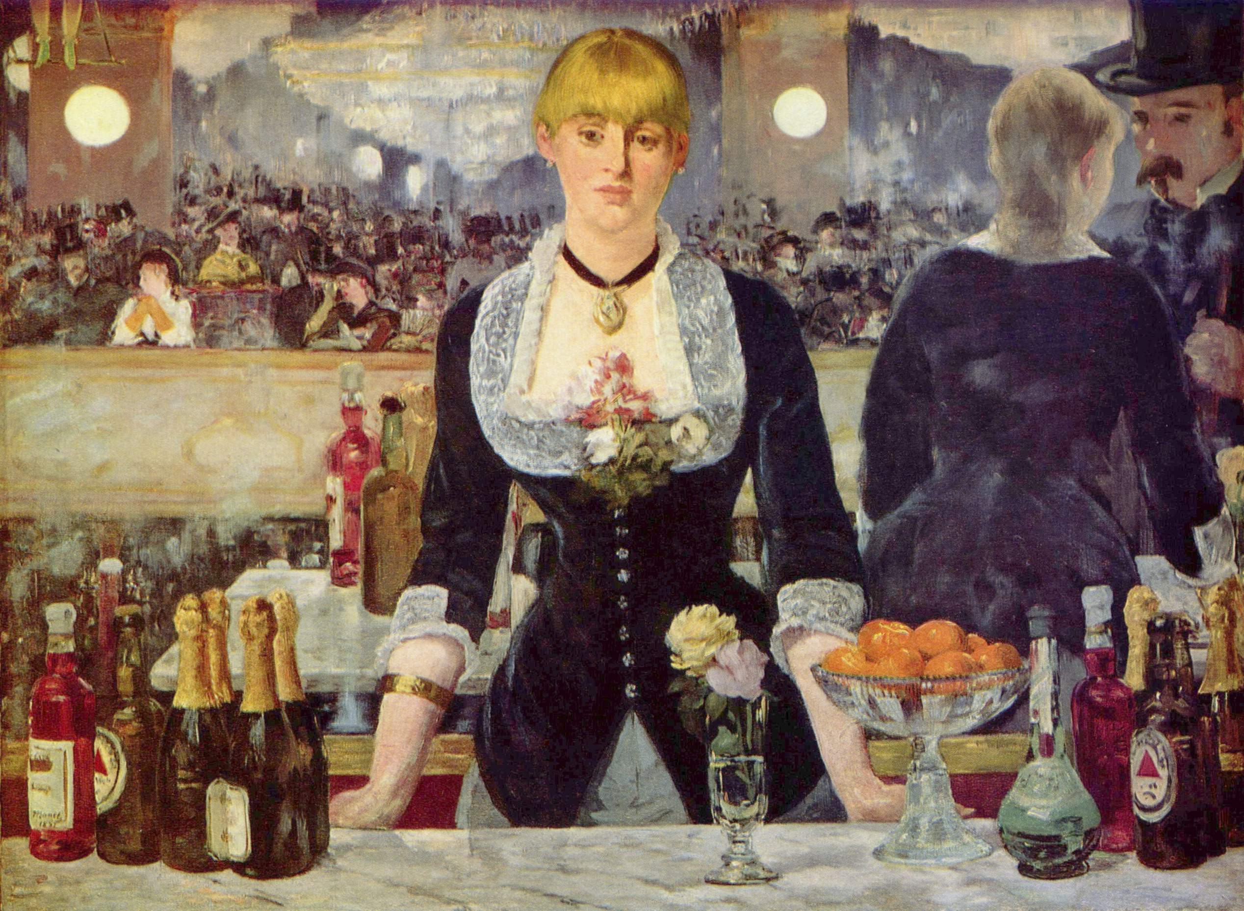 A woman in a black dress stands behind a marble bar with bottles, fruit, and flowers; a crowded, mirrored room is reflected behind her.
