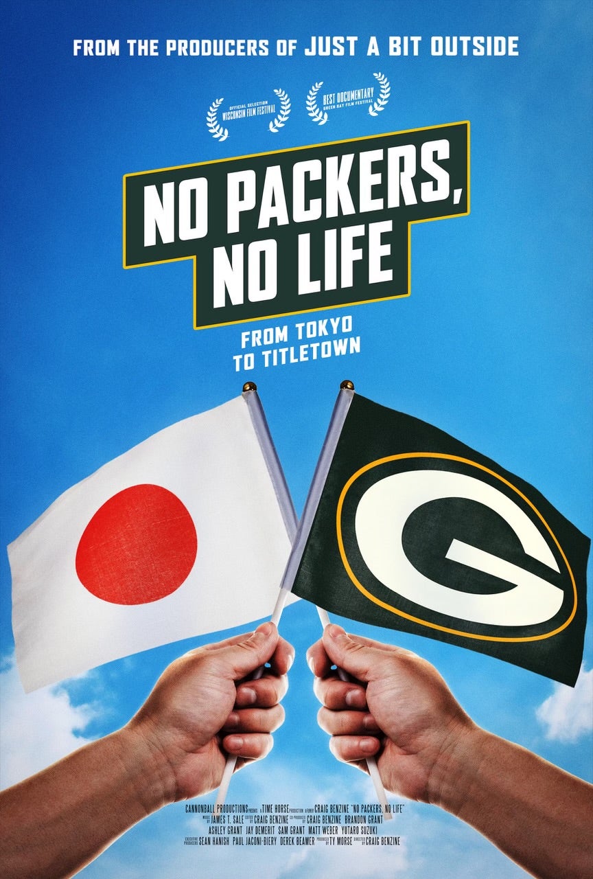 Two hands hold up the Japanese flag and the Green Bay Packers flag against a blue sky, with the text No Packers, No Life: From Tokyo to Titletown above.