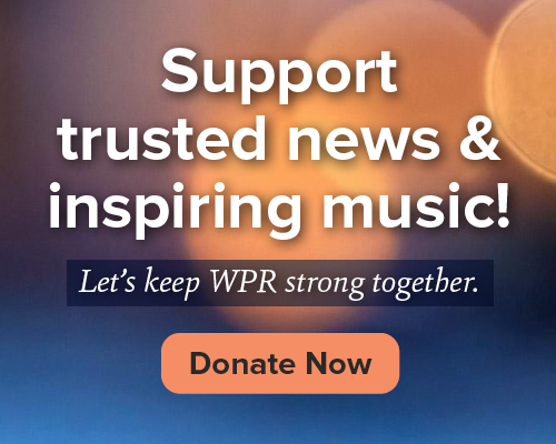 Text reads: Support trusted news & inspiring music! Let’s keep WPR strong together. Donate Now. Background features soft, out-of-focus lights in warm tones.
