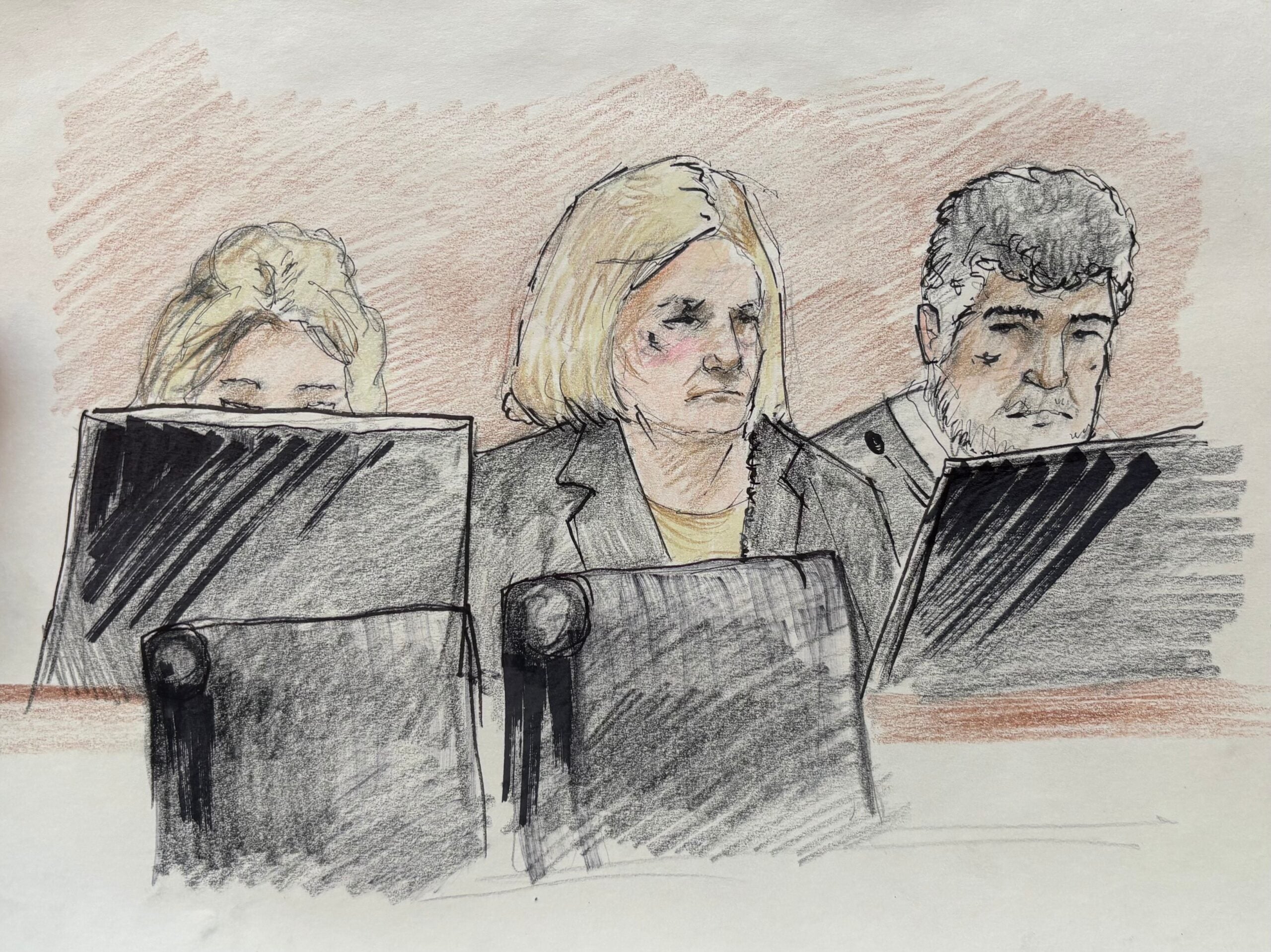 A courtroom sketch shows three people seated behind computer screens, focusing on their monitors.