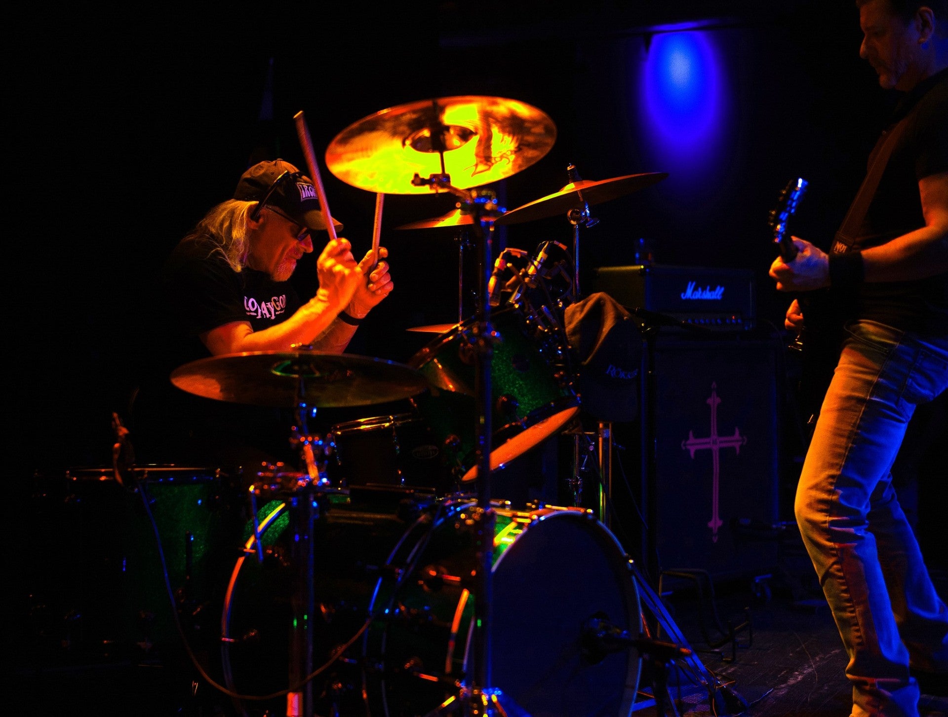 Rökker playing drums on stage, nine months after heart attack.