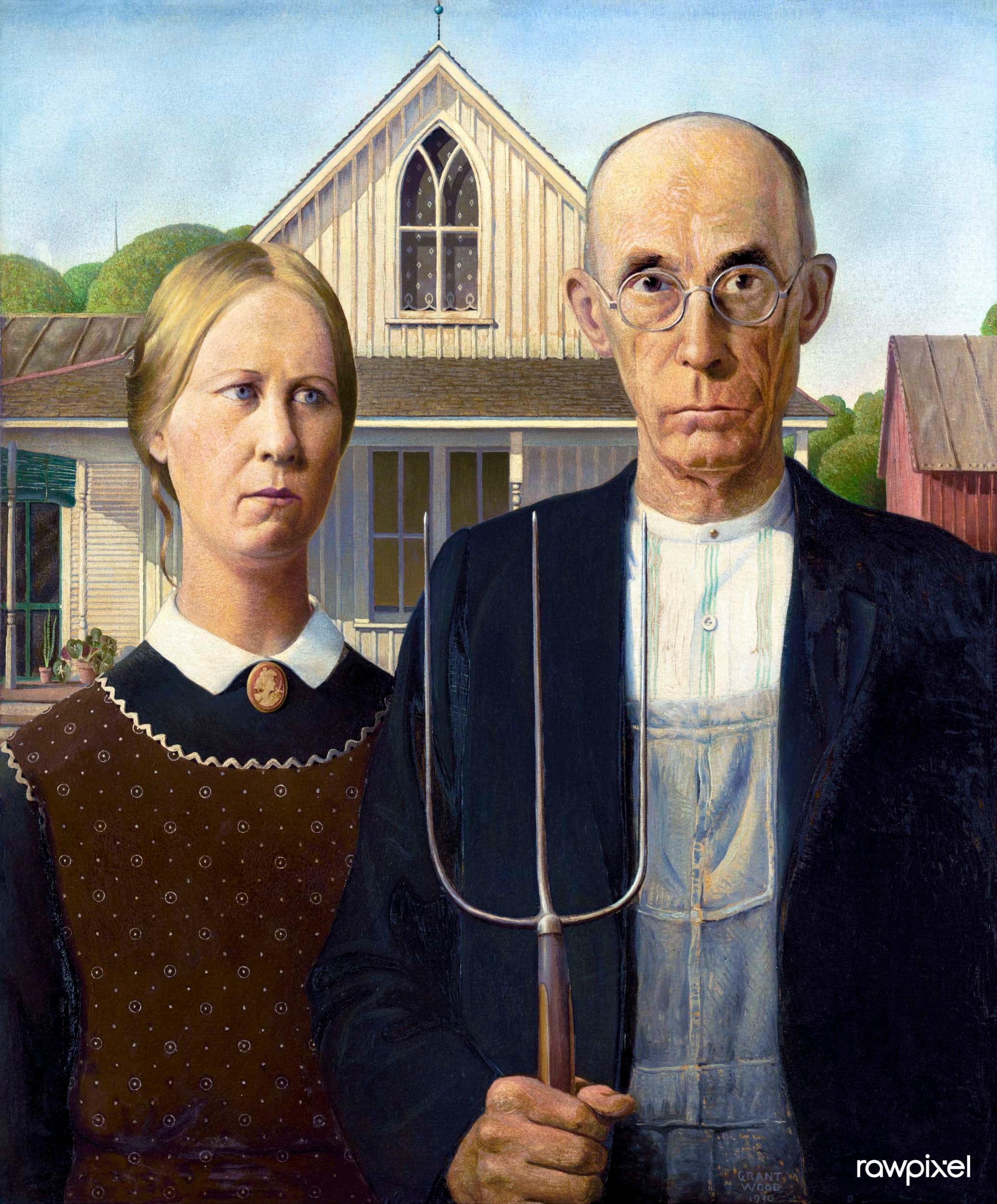 A man holding a pitchfork stands beside a woman in front of a wooden house with a gothic window; both have serious expressions.